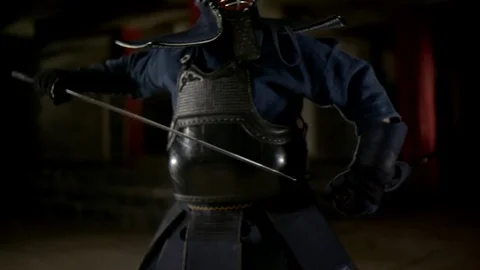 Kendo warrior demonstrates fighting attacks Stock Footage 77233688