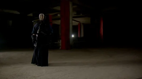 Kendo warrior demonstrates fighting attacks Stock Footage 77234023