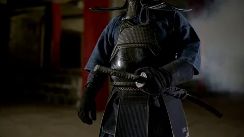 Kendo warrior demonstrates fighting attacks Stock Footage 77234227