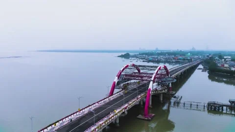 Kenjeran bridge in the calm cloudy morning Drone Flying Stock Footage 231820607