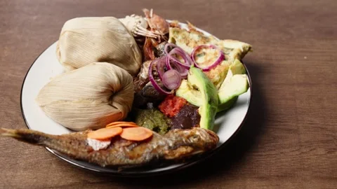 Kenkey With Fried Fish, Shrimps, Pear, Pepper Sauce and Fried Egg, Ghana Dish Video stock 346249774