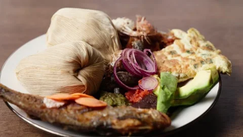 Kenkey With Fried Fish, Shrimps, Pear, Pepper Sauce and Fried Egg, Ghana Dish Video stock 346249857