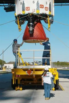 KENNEDY SPACE CENTER, FLA. - Workers on Launch Complex 17-B, Cape Canavera... Stock Photos