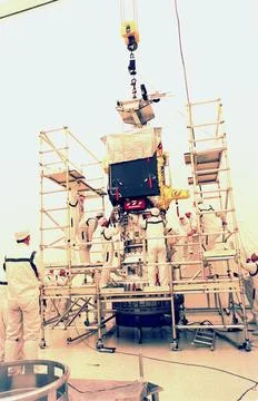 KENNEDY SPACE CENTER, FLA. -- Workers in the Defense Satellite Communicatio.. Stock Photos