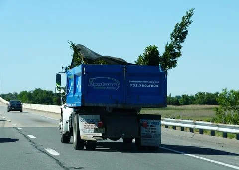 Kent County, Delaware, U.S.A - May 21, 2026 - Blue dump truck of Pantano Ou.. Stock Photos