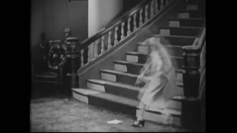 KENTUCKY - 1925 - In this romantic comedy, Nellie picks up and reads a telegram Stock Footage 323261498