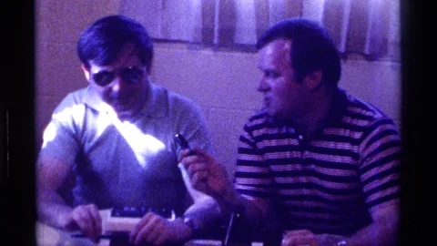 KENTUCKY-1976: An Interview Between Two Men Using an Old Microphone Stock Footage 125593086
