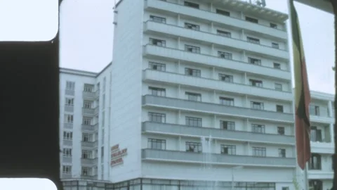 Kenya 1970s, View of large hotel view beside street in Nairobi Stock Footage 313782801