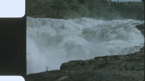 Kenya 1970s, Waterfall view surrounded by rock objects Stock Footage 313782518