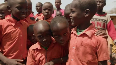 Kenya, Loima - May 5, 2025: Group portrait of african children on street of Vídeos de archivo 311920208