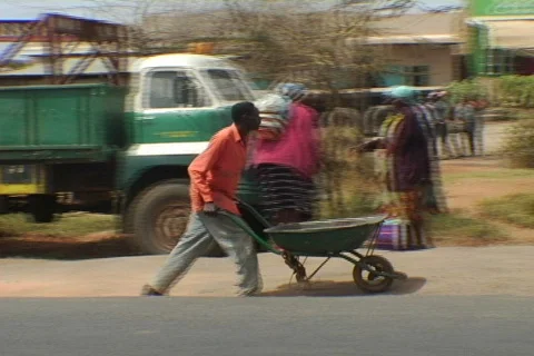 Kenya wheelbarrow 01 Stock Footage 608636