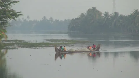 Kerala backwaters canoe with sand  Stock Footage 24278213
