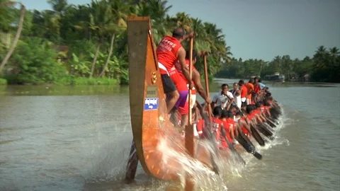 Kerala snake boat team practicing in back waters of Alleppey India Stock Footage 89758929