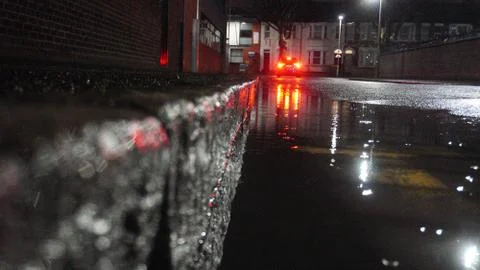 Kerb and reflection of a headlamp Stock-Fotos