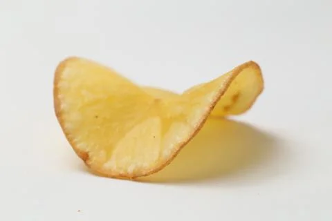 Keripik singkong or Cassava chips are snacks made from sliced cassava and then f Stock Photos