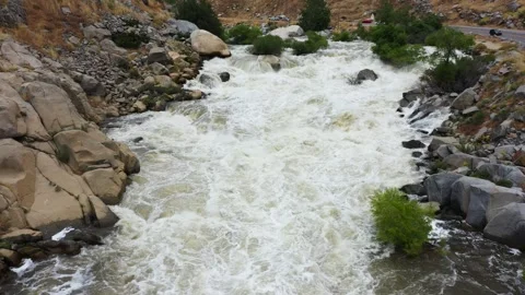 Kern river from above after intense flooding with water rushing hard next 動画素材 243084256