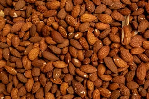 Kernels nuts almonds close-up, full frame. Top view Stock Photos