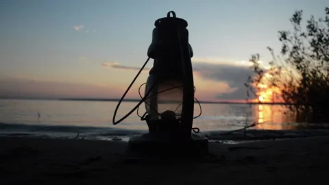 Kerosene lamp on the sand Stock Footage 90525237