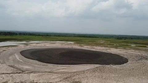 The Kesongo mud volcano area, Blora, Indonesia. Dry circular lake bed Stock Footage 279754732