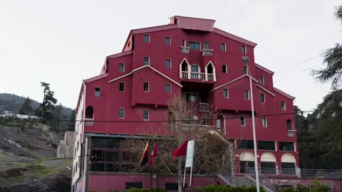 Ketama hotel and flags view Stock Footage 240398422