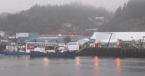 Ketchikan Alaska fish processing factories from ship rain 4K Video stock 210044633