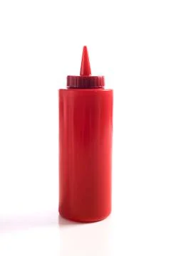 Ketchup bottle on white Stock Photos