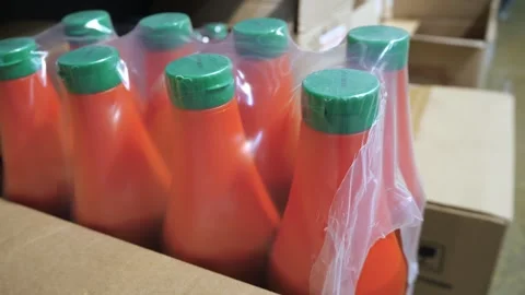Ketchup bottles. Ketchup packages in warehouse Vídeo Stock 264802441