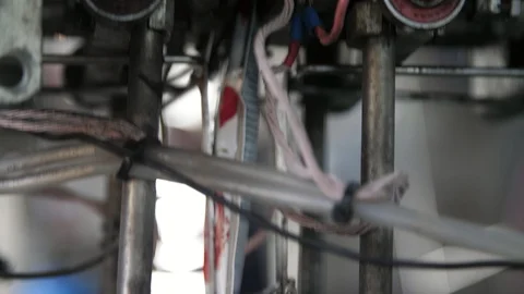 Ketchup packages falling from a conveyor device in a tomato processing plant Stock-Footage 119967348