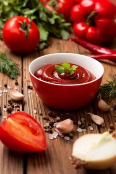 Ketchup in a red cup Stock Photos