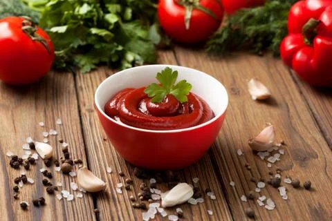 Ketchup in a red cup Stock Photos