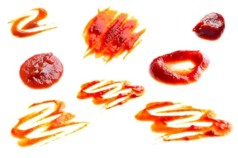 Ketchup splashes isolated on white Stock Photos