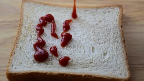 Ketchup on toast Stock Footage 335203641