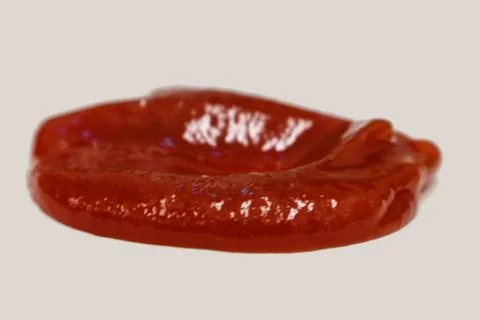 Ketchup on the white background Stock Photos