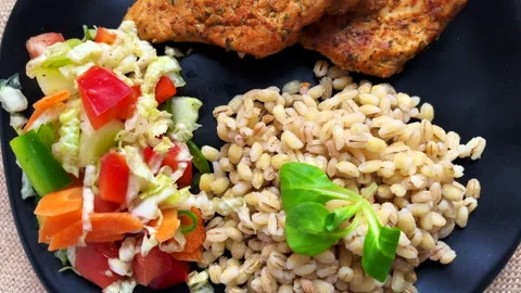 Keto dinner with grilled chicken Stock Footage 222611149