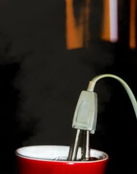 Kettle and a mug Stock Photos