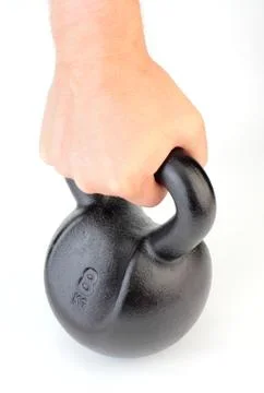 Kettle Bell in Hand Stock Photos
