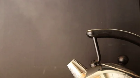 A kettle boiling Stock Footage 92782886