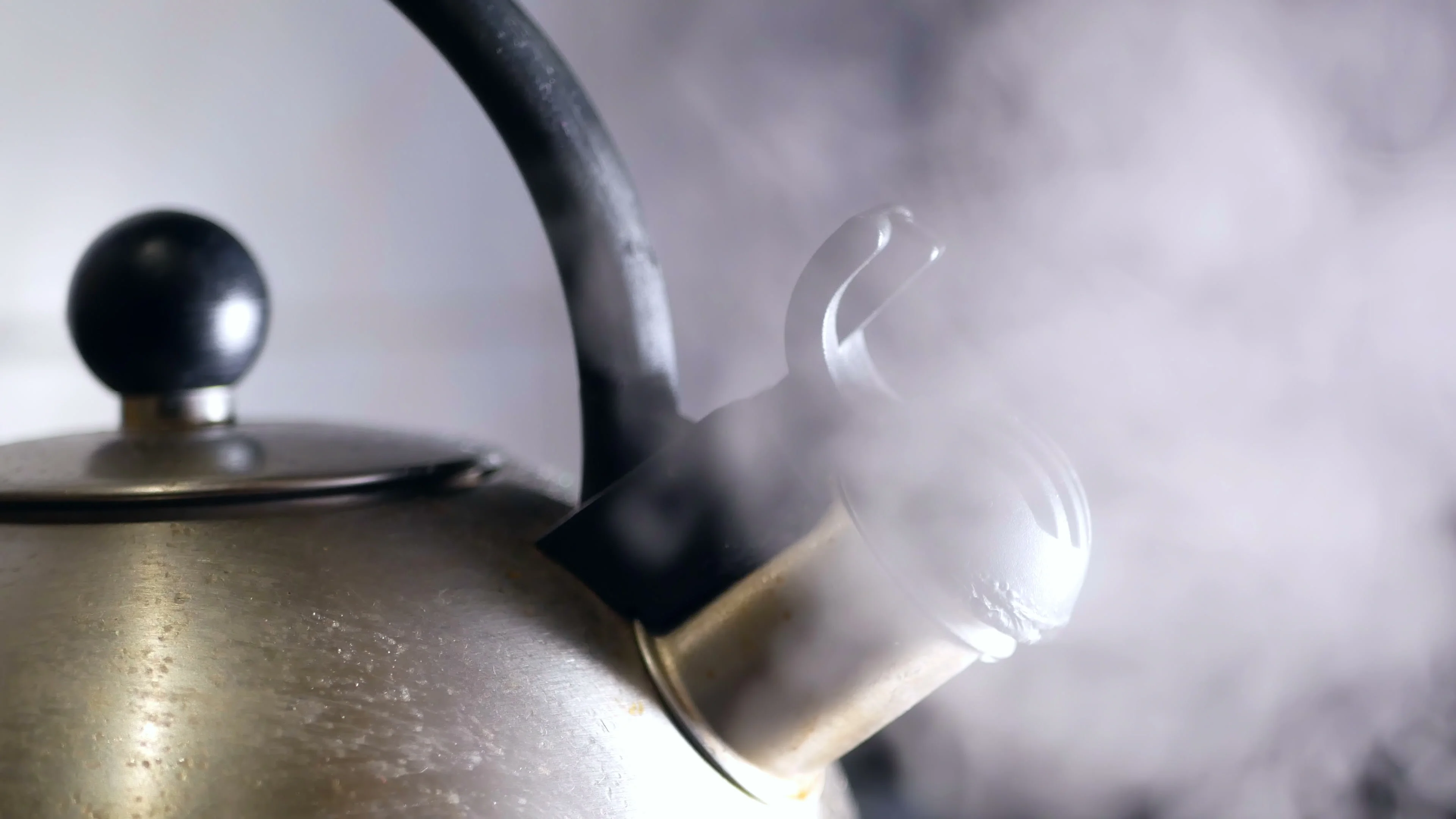 Kettle boiling hot stove, Stock Video