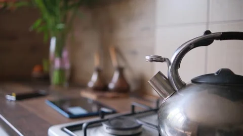 The kettle is boiling on the stove Video stock 243004340