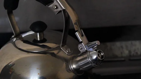 Kettle with boiling water for coffee, taking out hot steam Video stock 122790434