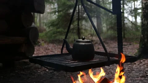 Kettle on campfire in forest. Stock Footage 168800764