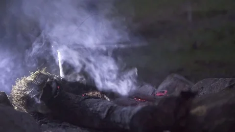 Kettle on campfire at night Stock-Footage 72504928