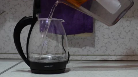 Kettle filled in the kiеchen Video stock 49823797