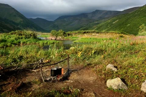 Kettle on a fire Stock Photos