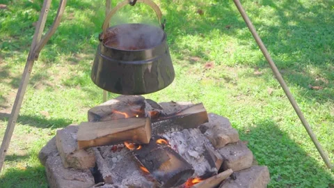 Kettle on a fire pit Stock Footage 140206934