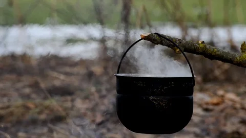 Kettle with fish soup cooked on fire Stock Footage 73371979
