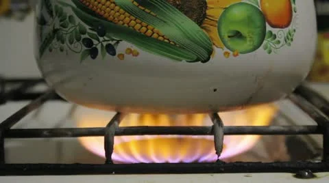Kettle on the gas stove Stock Footage 14808493