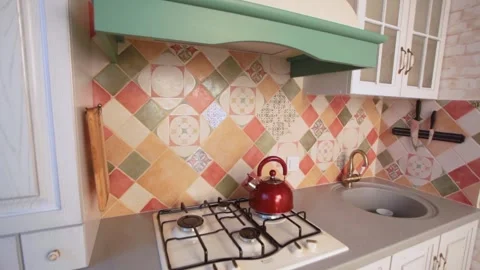 The kettle is on the gas stove in the kitchen Stock Footage 153803750