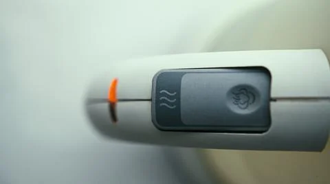 Kettle handle and release button, white goods concept Photos