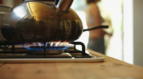 Kettle heated on the stove Stock Footage 66796227